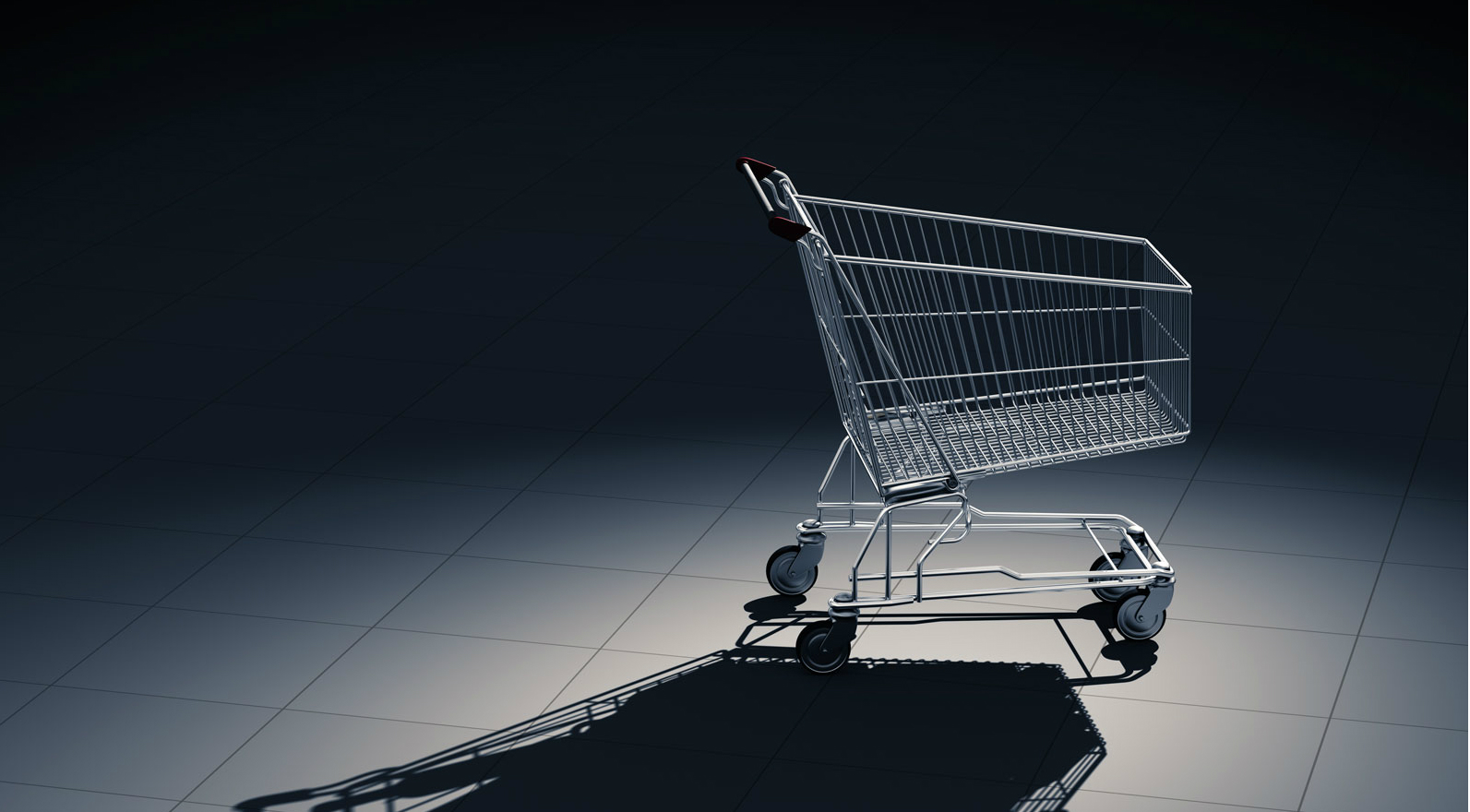 Shopping cart in dark space with a shadow
