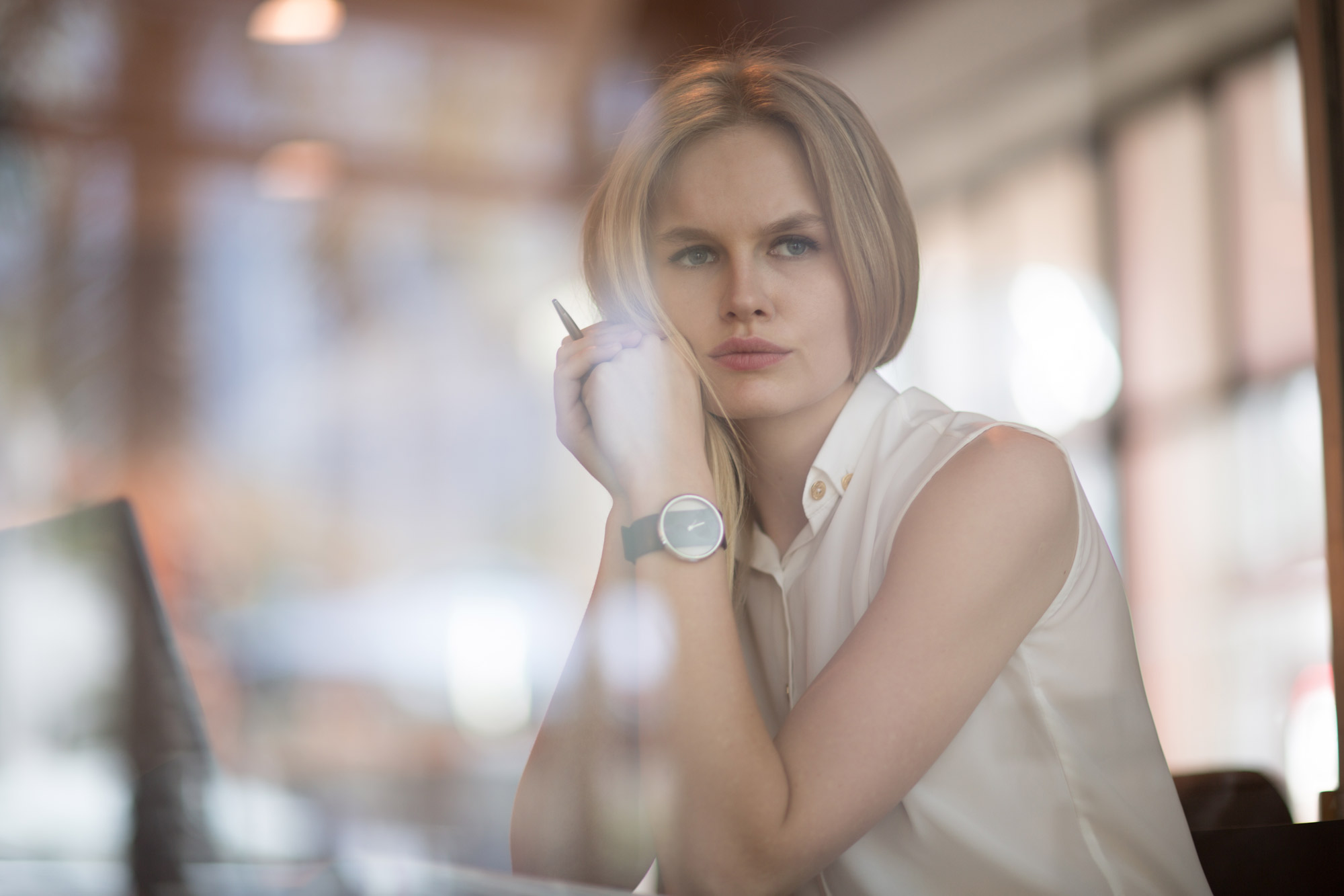 Woman sitting by a computer