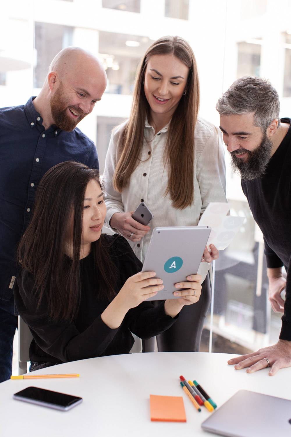 Apsis employees working on a drip marketing flow.