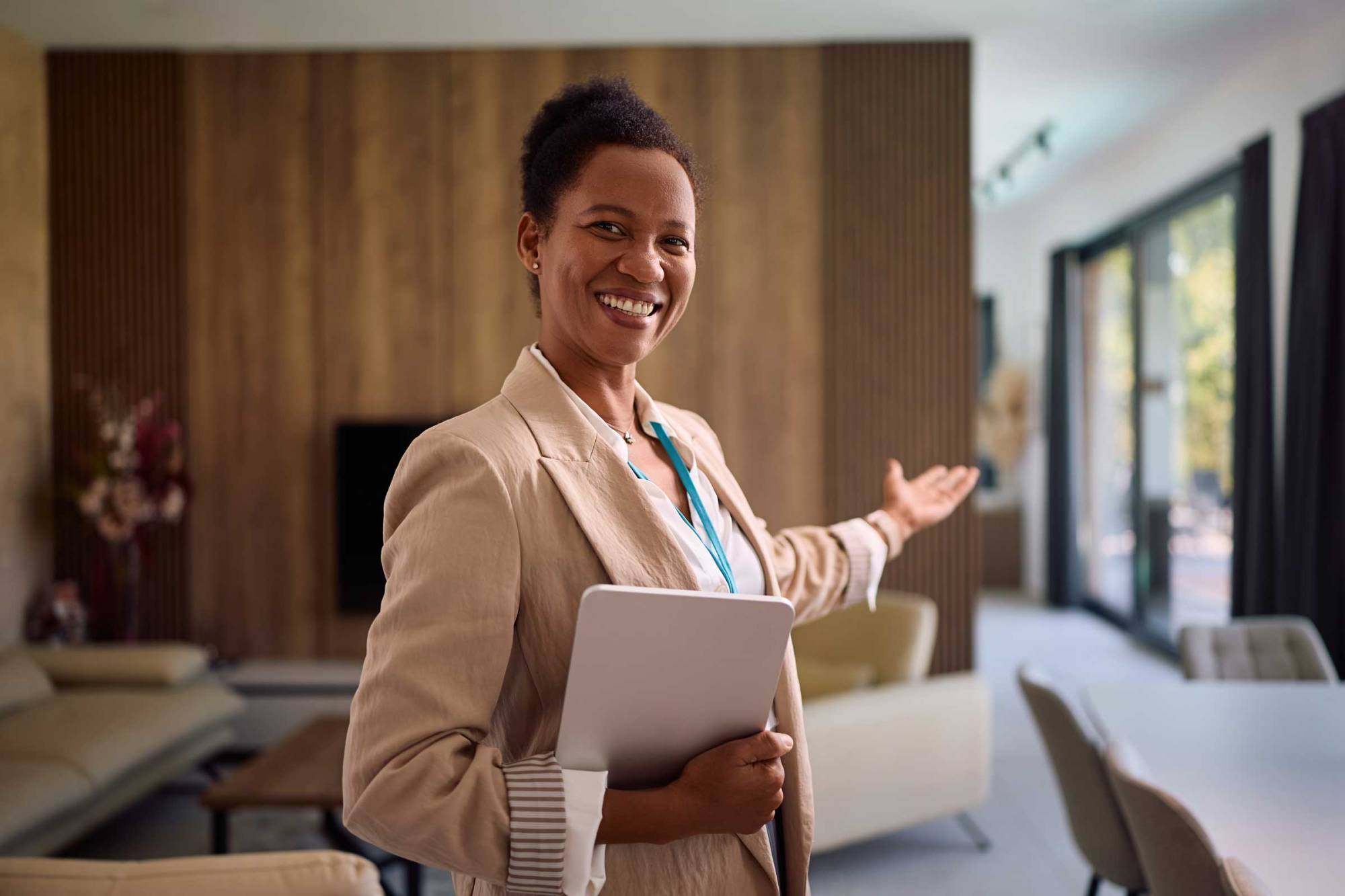 Real estate agent inviting gesture.
